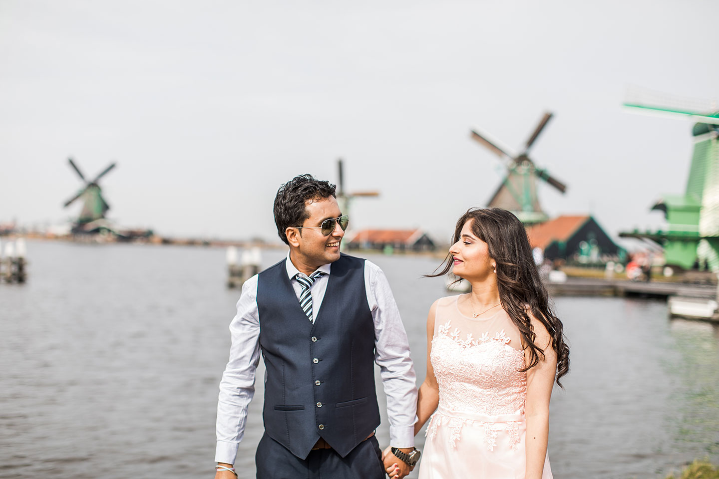 Prewedding photoshoot at Zaanse Schans windmill village near Amsterdam, Holland for an Indian couple
