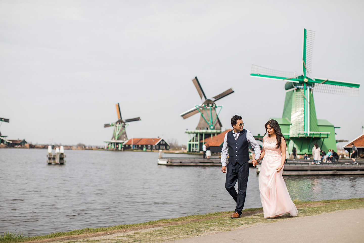 Prewedding photography Indian couple at Windmills of Zaanse Schans near Amsterdam, Holland