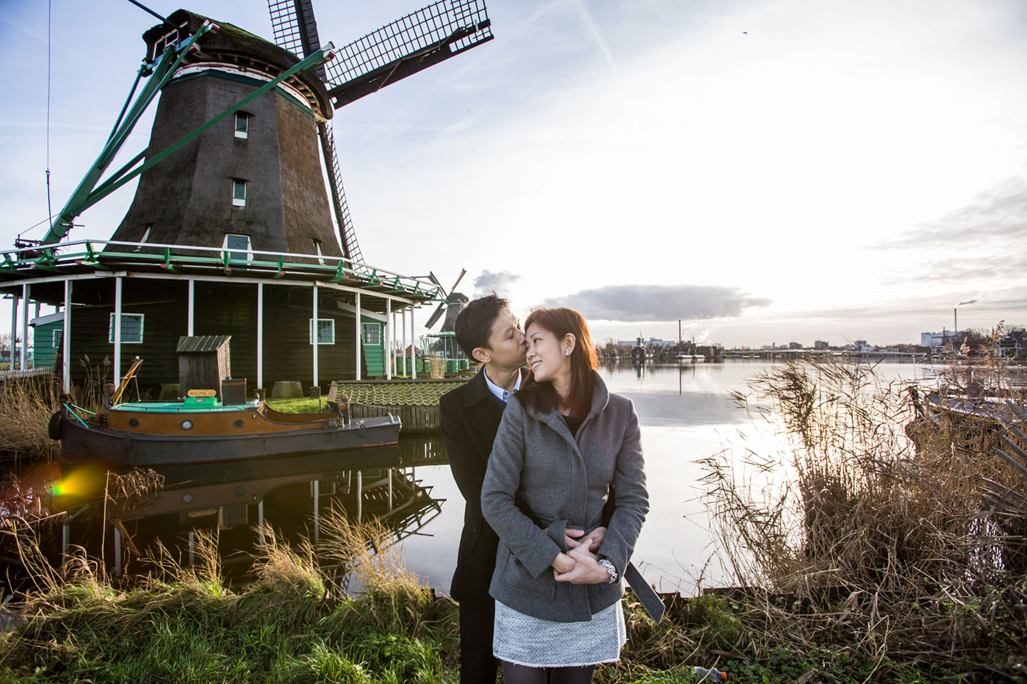 Prewedding shoot in the Netherlands at sunset with a windmill in the back