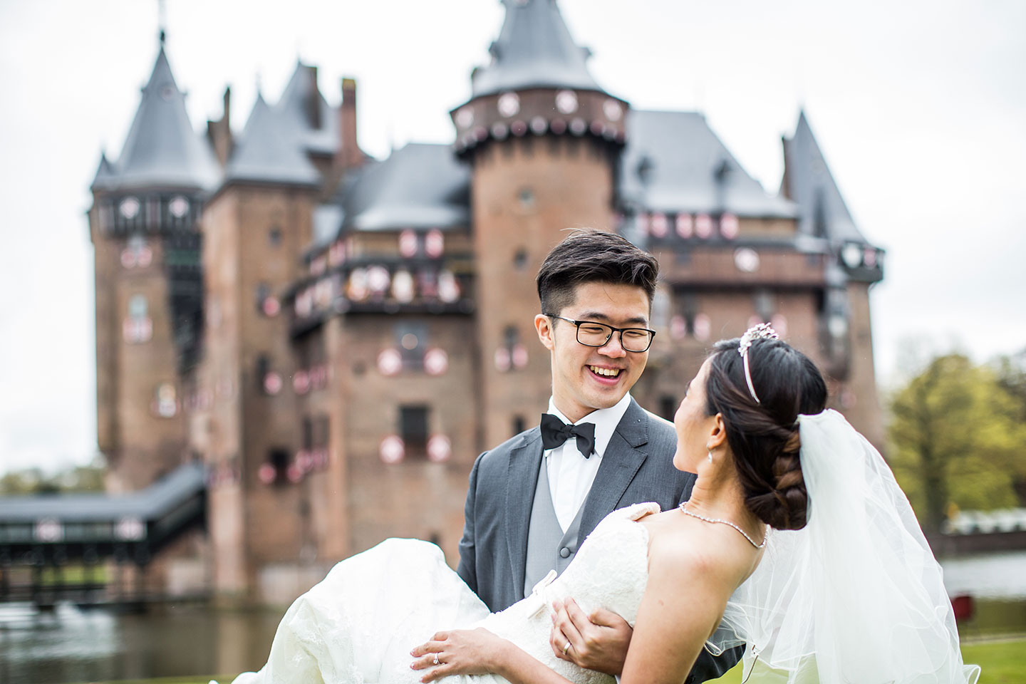 Asian couple at a castle during their pre-wedding shoot
