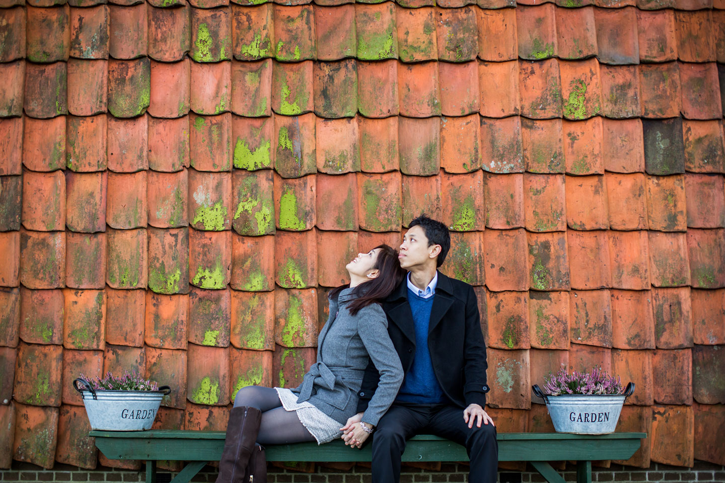 Asian couple in the winter during a photoshoot in Amsterdam