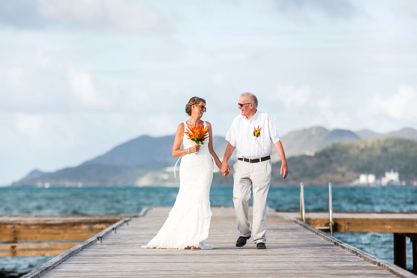 Bride and father during wedding ceremony in the Caribbean