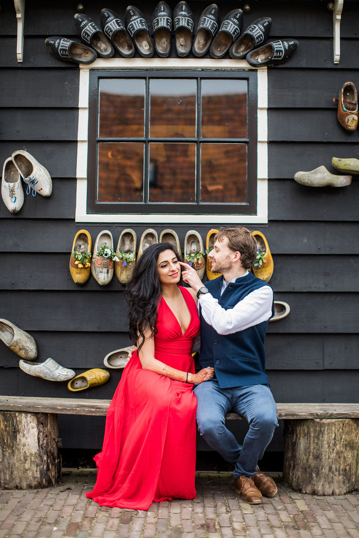 Couple having fun during their photoshoot in Amsterdam